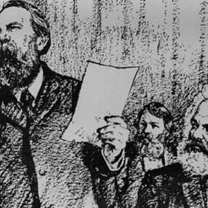 Rysunek mówiącego Engelsa trzymającego kartkę z Marksem siedzącym obok